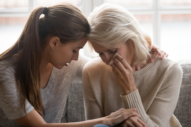 woman comforting her mother